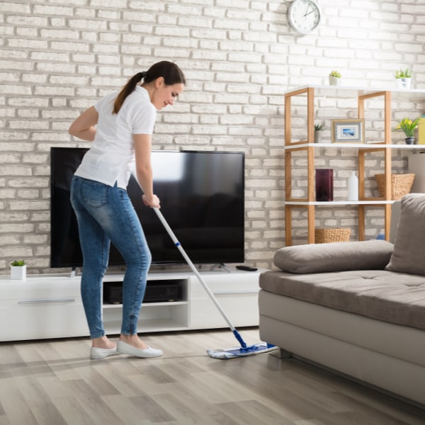 Women cleaning Hardwood floor | Affordable Flooring Warehouse | Steamboat Springs, CO